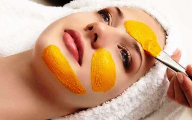 Haldi on face